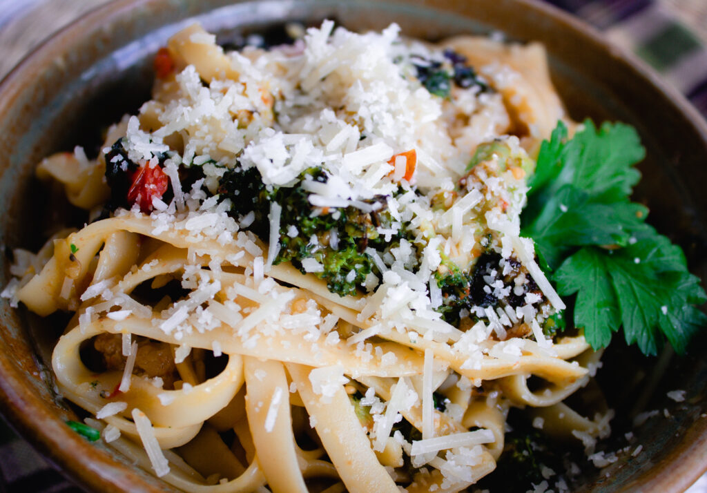 This recipe is nearly a one dish, sheet-pan supper. Just boil noodles while all the veggies roast together. The tomatoes burst and mix with butter to form a rich delicious sauce to spoon over the pasta. Top with grated parmesan. Roasted Garden Veggie Pasta is absolutely full of fresh flavor and couldn't be easier to make. 