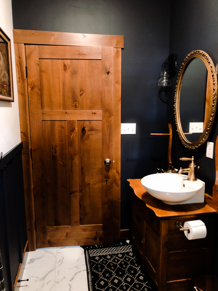 Does a sexy dark wall color in a SMALL bathroom scare you? Don't let it. Dark walls - even black can be done. The resulting space is moody, intimate cozy and Timeless. Let share with you how you too can create this look. 