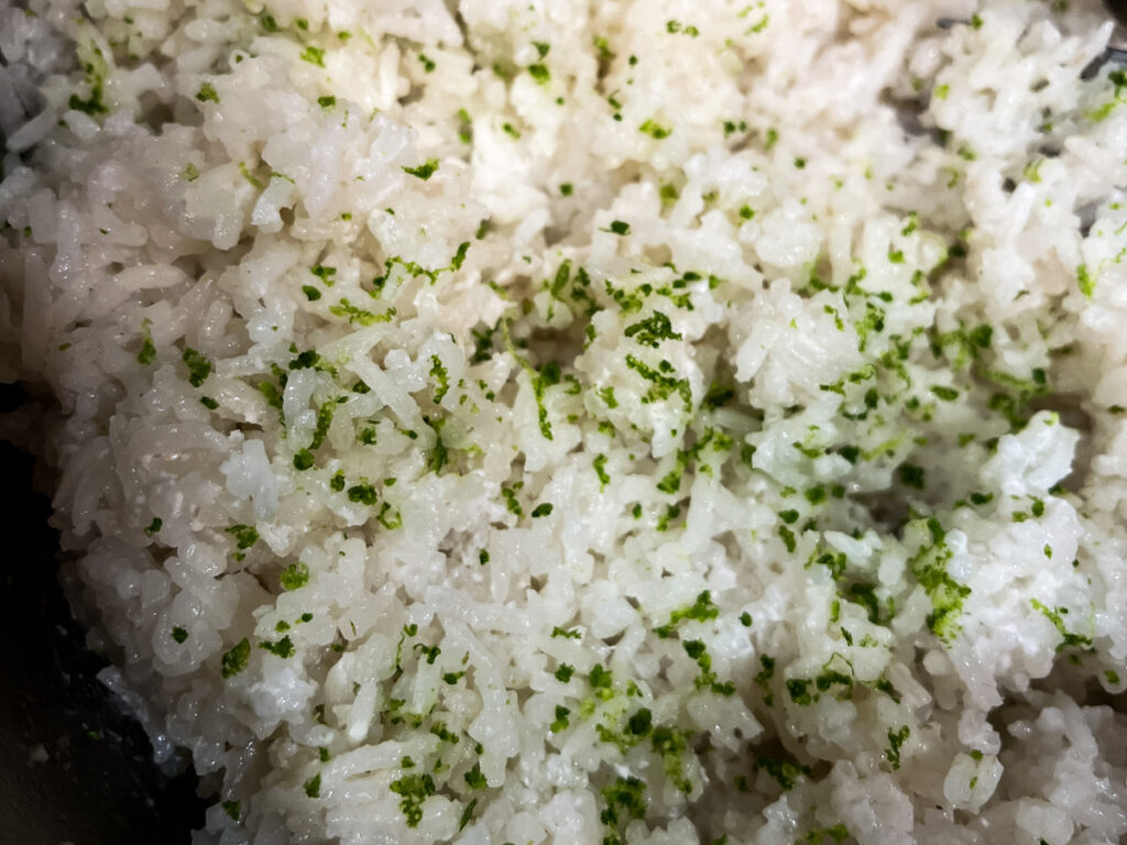 This Coconut Lime Rice is perfectly creamy, soft and only slightly sweet. The fresh, tangy flavor of the lime zest makes this dish sooo good. As if that all wasn't good enough - this is a super simple and fast Instant Pot Recipe too. 