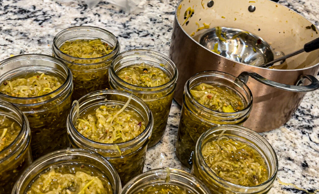 Are you looking for the perfect recipe to use up your zucchini abundance? This zucchini relish recipe is perfect because it is slightly sweet, a little sour, simple to put together and delicious as a side to meat or mixed in sandwich spreads or appetizers. 