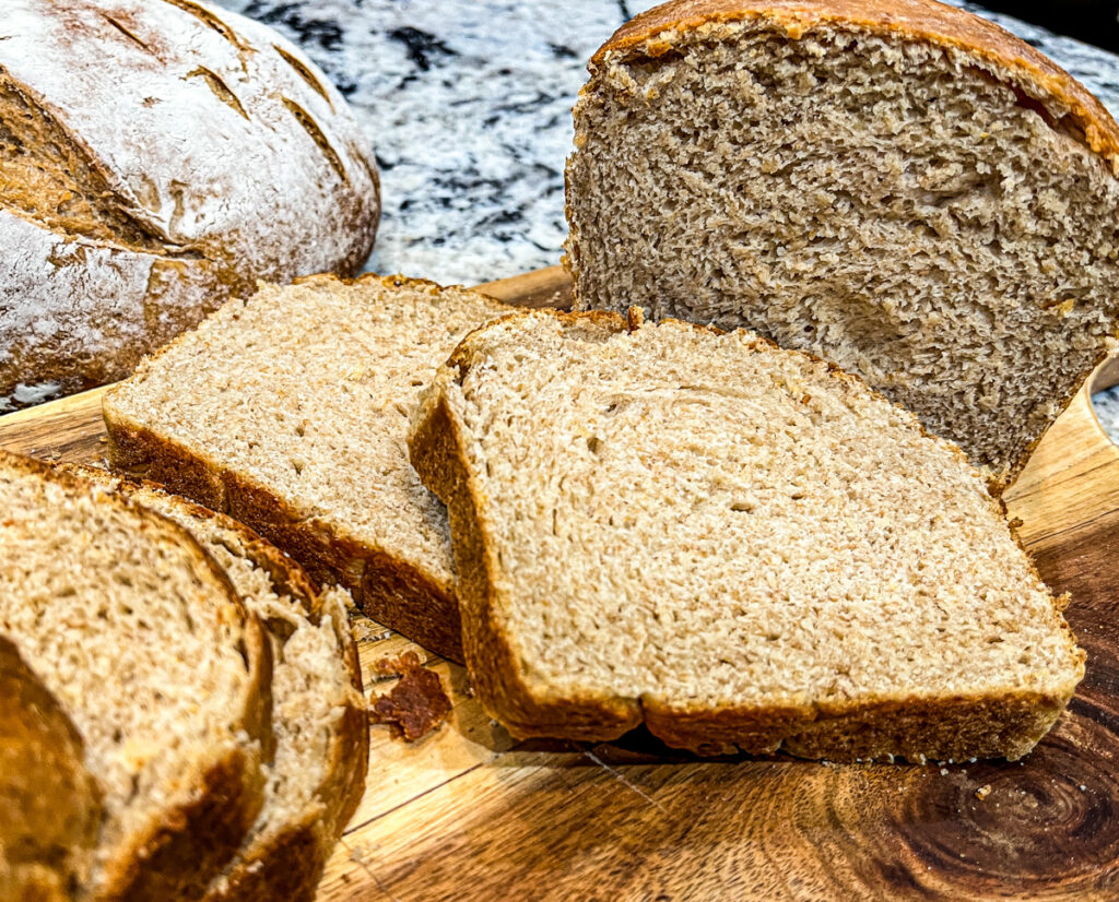 Old Fashioned sourdough Sandwich Bread Sliced on cutting board