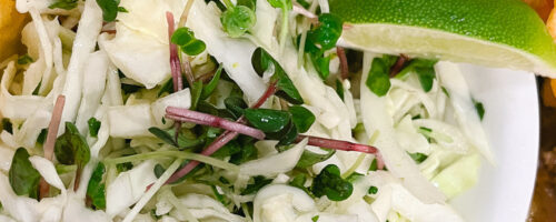 This Mexican Coleslaw is crisp and refreshing. The slightly sweet, citrus, vinegar & spice is an excellent contrast and compliment to rich Tex-Mex dishes including tacos, enchiladas, nachos and more. Radish Microgreens are the star adding vibrant color and a delightful spicy crunch!