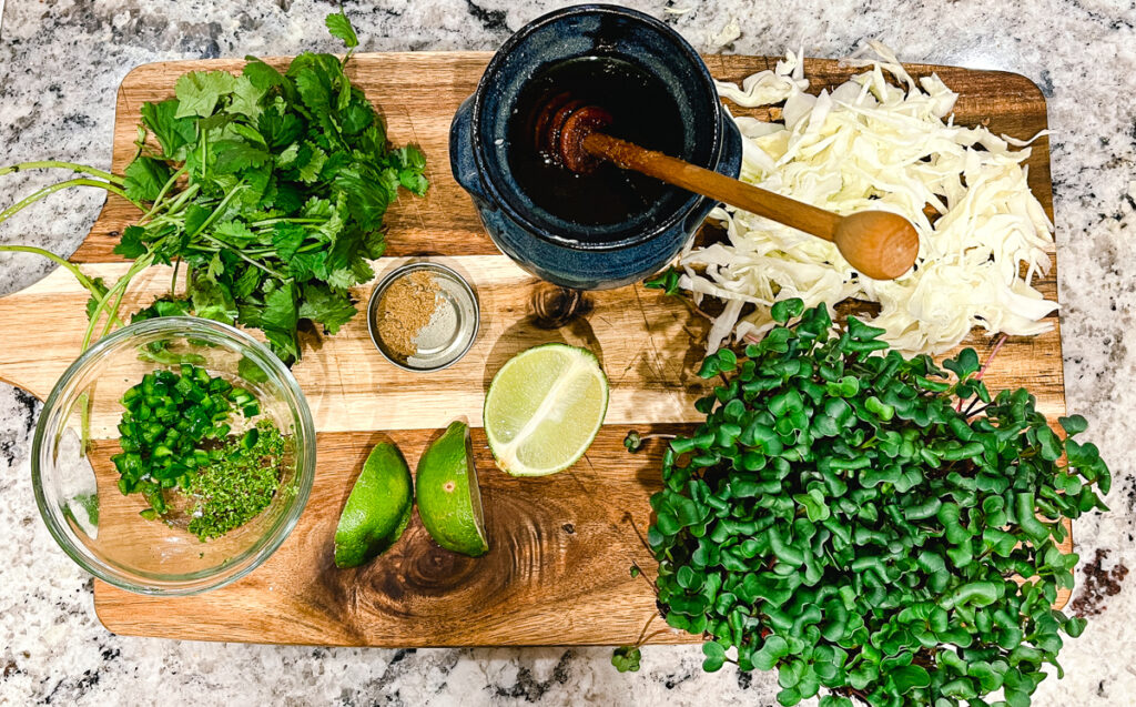 Microgreen Radish Mexican Coleslaw Ingredients on wooden cutting board