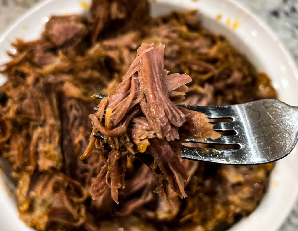 Pork roast is one of the most economical cuts of meat but sometimes it's just, well - bland. Let me share with you a recipe that is not only simple - it's SUPER flavorful and really pretty FAST. Thanks to an Instant Pot and some simple but delicious seasonings, you can have this Instant Pot Pork Carnitas on the table for your Taco Tuesday. 
