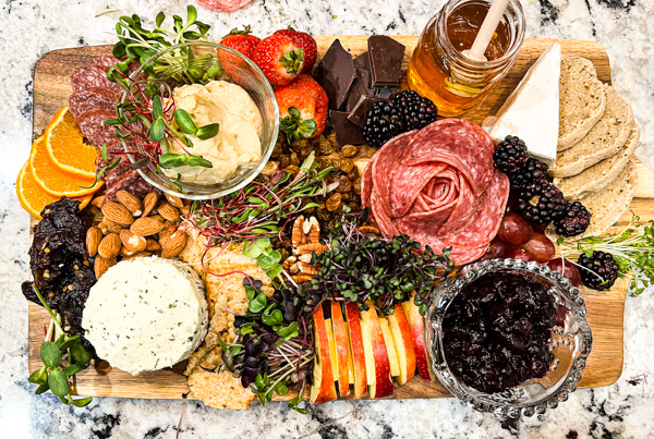 Completed Charcuterie board with microgreens